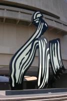 Large sculpture in form of a black and white brush stroke