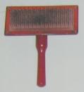 red-handled pet brush