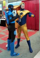 Ninja type in blue suit on left; generic superhero in yellow/blue costume on right