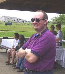 Man in purple shirt