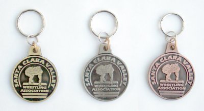 Gold, silver, and bronze medals made into keychains
