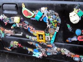 Detail of toys glued to side of pickup truck