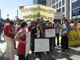 Unposed picture of atheist group holding signs