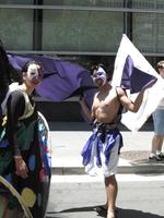 Masked dancers with fabric 