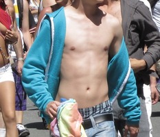 Shirtless asian guy in blue sweatshirt