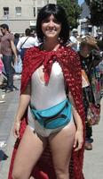 Woman in sequined red cape