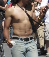 shirtless guy in denim shorts